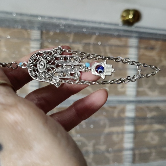 Hamsa Hand earrings with a turquoise bead - Picture 2 of 5